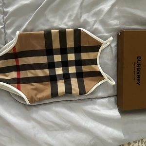 Burberry swimsuit baby. Still have box.